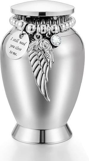Small Keepsake Urns for Memorial Human Ashes 2.85 Inch with Wing Charm Mini Cremation Urns Stainless Steel